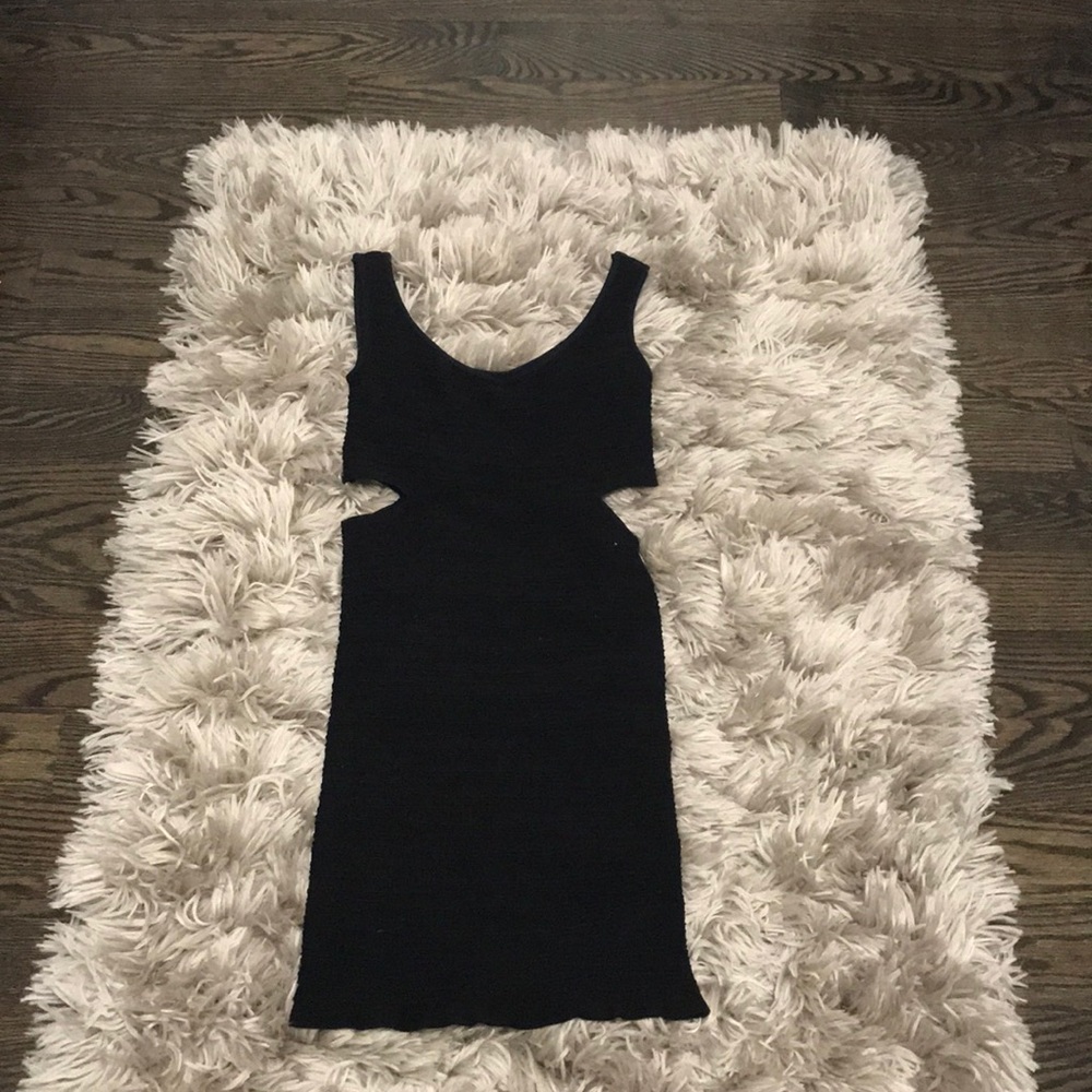 Tight black dress with slits in the side